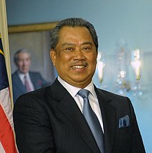 A formal photo of prime minister Mahathir Mohamad.