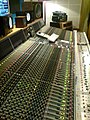 Image 2Neve VR60, a multitrack mixing console. Above the console are a range of studio monitor speakers. (from Recording studio)