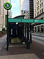Headhouse and bus stop on the northeast corner of 13th & Market streets