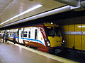 A Class 334 at Glasgow Central low level with a service to Milngavie