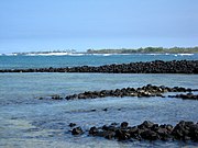 ʻAiʻopio Fish trap at Honokōhau viewed from the beach