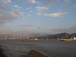 Qingzhou Bridge spans the Min River, connecting Mawei District with Changle District