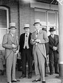 Men in morning grey suits at the races in Australia, in 1937