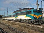 A class 269 electric locomotive pulls the TerraSur Temuco passenger train at Temuco, Chile, in 2008