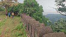 Wall of Fort and Dhanraul Dam in background