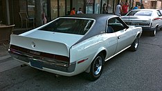 Shows a 1970 AMC Javelin featuring optional full black vinyl-covered roof