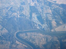 Aerial photo of Pinesburg (top right). Pinesburg Quarry can be seen in the foreground.