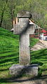 19th-century stone cross placed in the park