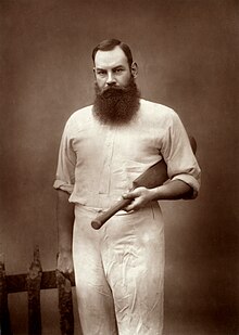 WG Grace holding a cricket bat.