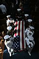 A casket team carries Major Douglas A. Zembiec, former commander of E Company, 2nd Battalion, 1st Marine Regiment from the Naval Academy Chapel in Annapolis, Maryland following a funeral service held in his honor.