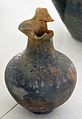 Etruscan impasto vase with an engraved inscription in Greek letters, mae by its owner MI HUSTILEIA; c. 700675 BC; damaged in 1945 by fire.