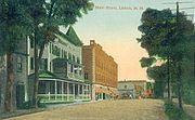 Postcard of Main St featuring Lisbon Inn circa 1910