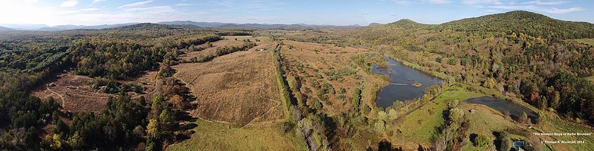 Panoramic image taken from a drone at an altitude of approximately 200 meters in September, 2014. Facing north, this shows the western side of Battle Mountain and Little Battle Mountain on the right, with Aaron mountain visible on the left. The Blue Ridge Mountains of Shenandoah National Park are visible on the horizon.