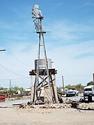 Abandoned farm windmill and water tank located on Main Street.