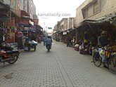 A picture of Iqbal Bazaar Kamalia showing the bustle and hustle life of its citizens.
