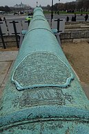 Long cannon barrel with inscription in Arabic script