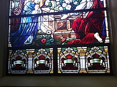 Stained-glass windows from inside Our Lady of Czestochowa Catholic Church in Jersey City, NJ. The bottom stained-glass windows have text in Polish to commemorate the explosion in 1916.