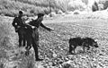 Grenztruppen with a German Shepherd service dog