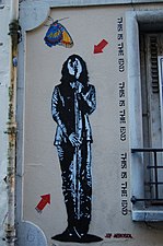 Stencil graffiti by Jef Aérosol in Paris