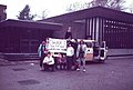 Collingwood College in c. 1979 showing the original entrance behind a gathering of students setting off for a charity event