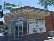 Close-up view of the Glendale Pharmacy historic structure, located at 5625 W Glendale Ave., which was built in the 1940s and once also housed a Post Office. (notice the old pharmacy sign) (GAHS).