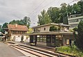 old and new station buildings in 2000