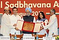 Dr. Karan Singh, along with Prime Minister Manmohan Singh and Rahul Gandhi present the Rajiv Gandhi National Sadbhavana Award to Dr. Kiran Seth in 2011.