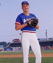 A baseball player in red, white, and blue