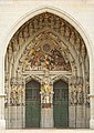 The minster at Bern, with Christ in Majesty surrounded by the apostles in the archivolt, and a Last Judgement in the tympanum