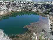 Montezuma Well is a detached unit of Montezuma Castle National Monument located near Rimrock and Camp Verde, Arizona. The Montezuma Well is a natural limestone sinkhole. It is listed in the National Register of Historic Places, reference #66000082.