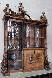 Bookcase with sculpture by François-Rupert Carabin (1890)