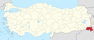 Hakkari highlighted in red on a beige political map of Turkeym