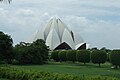 The Lotus Temple with trees in front