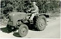 Sami Shmuel Mayer on his Holder tractor, 1957-58