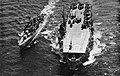 USS Gilbert Islands and USS Hailey (DD-556) underway at sea in 1954.