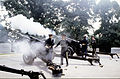 Members of the Presidential Salute Guns Battery of the 3rd United States Infantry Regiment "The Old Guard" render a gun salute using three-inch anti-tank guns (modified to 75mm caliber) during a military funeral held at Arlington National Cemetery on August 10, 1998.