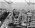 Taken 20 January 1943, shows construction of HMS Calder (K349) (ex-DE-58) on the left and USS Foss (DE-59) on the right. Thanks to Emoscopes for pointing this one out to me.