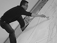 Liu Xiaodong during a performance artwork