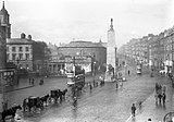 Trams on the street (historical black and white photo)