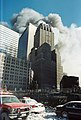 WTC 7 burning behind the Verizon Building.