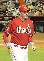 A man in a baseball uniform