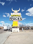 Vintage Pow Wow Motel sign on Route 66]]