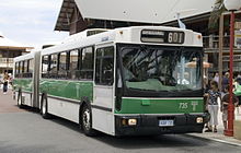 1980s white and green bus