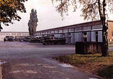 A photograph of A Squadron 3 RTR's tank park inside Barker Barracks c1981. Taken from ground level directly behind the main HQ building it is looking northwards.[4]