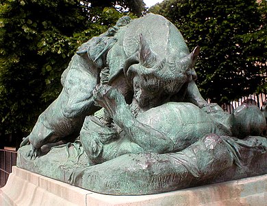 Rhinoceros attacked by two tigers by Auguste Caïn. Bronze, (1882)