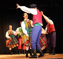 Dancers from the Polanie Folk Dance Group in Ottawa wearing costumes from the Opoczno region.