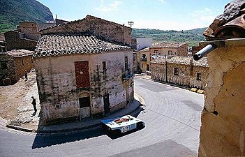 Porsche 908/3 driven by winners Jo Siffert and Brian Redman in 1970, going through a hairpin in Collesano with Siffert driving