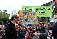 People in Melbourne celebrate World Environment Day 2011 with a rally to fund renewable energy. [30]