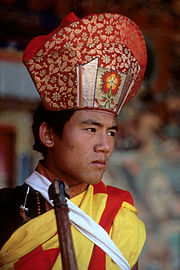 Young monk, wearing a special costume, July-August 1991, Sikkim, India.
