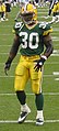 Ahman Green warming up to play against the Tennessee Titans